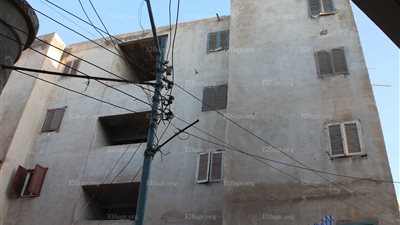 رئيس مجلس بنى عبيد ردًا على أهالي المساكن الشعبية.. المباني تتبع المجلس وصادر لها قرر إزالة منذ 2009 