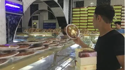 واشنطن بوست: رمضان في العراق.. كثير من الحلوى والياميش