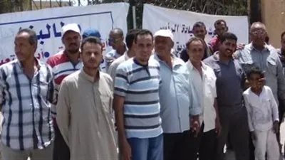 العاملون بـ