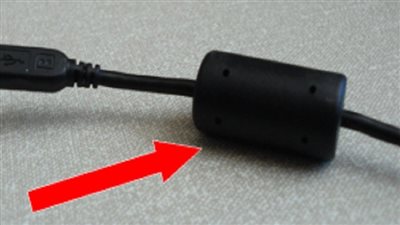 هل تعلم سبب وجود القطعة البلاستيكية على أسلاك شحن الحاسوب؟