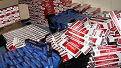 ضبط 115 ألف علبة سجائر متنوعة قبل بيعها بالسوق السوداء في أسيوط 