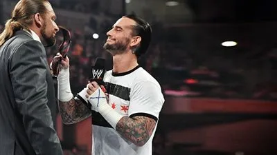 صورة توضح حقيقة سخرية تريبل أتش من خسارة سي أم بانك  