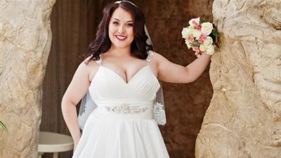 تصاميم لفساتين زفاف أنيقة لصاحبات الوزن الزائد (صور)