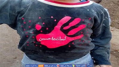 توزيع ملابس بـ 