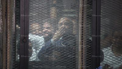 فرحة داخل قفص الاتهام في 