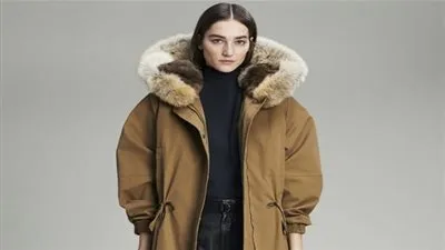 المعاطف الكاجوال.. عنوان الأناقة في العمل (صور)