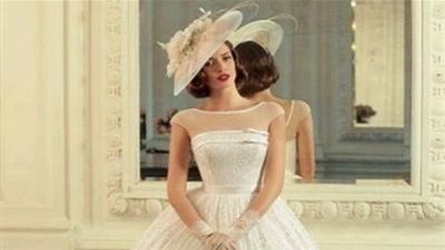 للعروس الخليجية.. فساتين عصرية تغنيك عن طرحة الزفاف (صور)