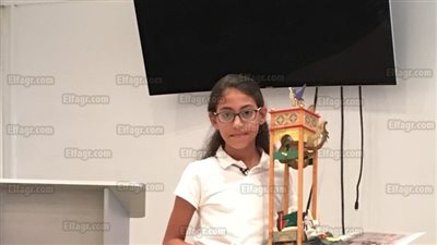 طفلة تشرح نموذجا لساعة الفيل للعالم العربي المسلم بديع الزمان الجزري بمكتبة مصر العامة