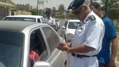 إزالة 70 موقفا عشوائيا في حملات مرورية بالجيزة