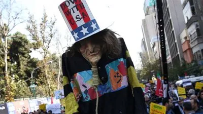 رئيس إيران يحذر من 