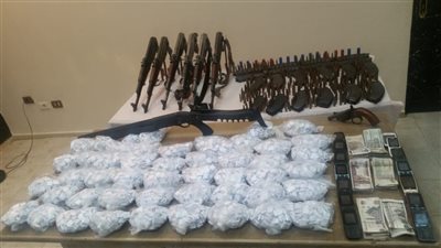 ضبط 24  قطعة سلاح ناري في الجيزة