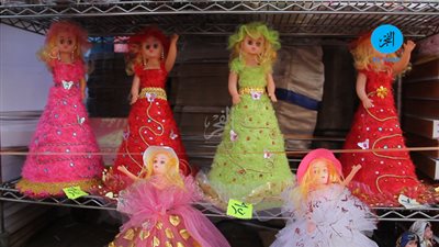 إقبال المواطنين على شراء حلوى المولد النبوي بالجيزة (فيديو)  	 	