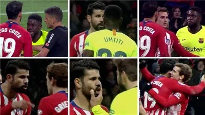 جريزمان يقف بجانب لاعب برشلونة ضد زميله