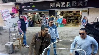 شرطة المرافق تزيل الإشغالات بشوارع الجيزة (صور)