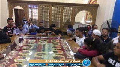 أهالي قرية العور تحتفل بعيد استشهاد ذويهم من أقباط ليبيا