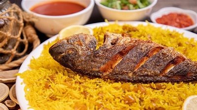 طريقة عمل الأرز مع السمك المشوي
