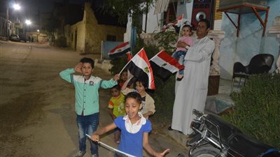 أطفال مدينة الإمام الأكبر يحتفلون بالاستفتاء على الدستور بحمل الأعلام الوطنية (صور)