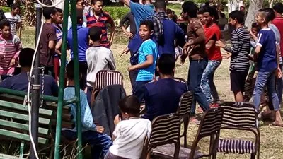 أهالي أسيوط يتحدون ارتفاع درجات الحرارة ويستمرون في التوافد على الحدائق والمنتزهات