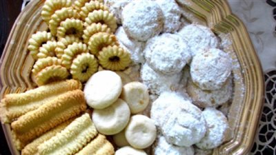 حلويات العيد.. طريقة عمل كحك العيد بالملبن.. وطريقة البيتي فور