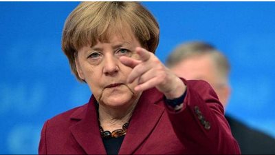 ميركل تحذر من 