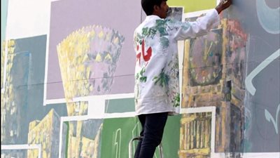 فنانو تبوك يعالجون التشوه البصري في شوارع المنطقة