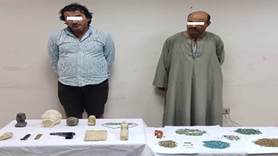 سقوط متهمين بحوزتهما 10 قطع أثرية ببولاق الدكرور