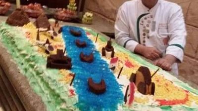 شاهد.. توثيق عبور خط برليف على أكبر تورتة احتفالا بذكرى أكتوبر بالغردقة