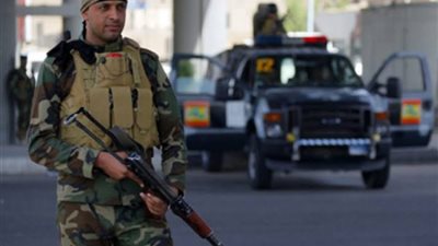 القوى الأمنية العراقية تطوق مكان اغتيال الناشط المدني وسط كربلاء