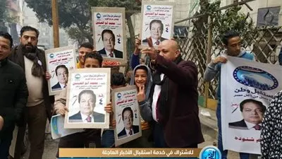 'تحدي للطقس السئ'.. مواطنون يشاركون بالانتخابات التكميلية في الجيزة