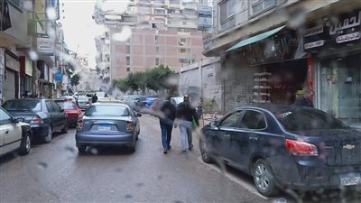 تساقط أمطار خفيفة على المنصورة (صور)
