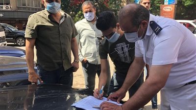 تحرير 18 محضرا لغير الملتزمين بارتداء الكمامة في الدقي