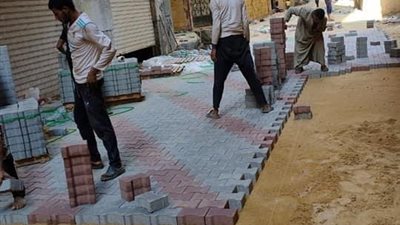 حي الهرم يواصل رفع كفاءة الطرق وصيانة أعمدة الإنارة