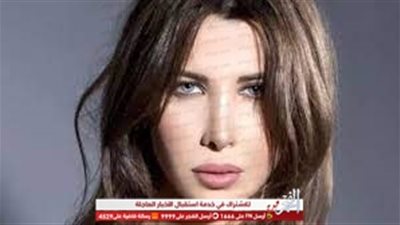 نانسي عجرم تحتفل بأحد السعف مع بناتها