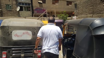 ضبط ١٢ مركبة توك توك ورفع ٤٦ حالة إشغال بالجيزة