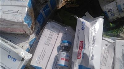 فتح تحقيق عاجل في واقعه العثور على لقاح كورونا بالقمامة بالمنيا 