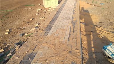 استمرار أعمال رفع كفاءة وتطوير شارع محمد سرحان بحي الزهور 