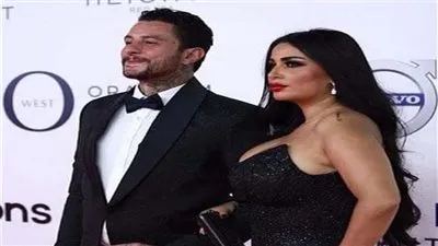 بعد انفصالهما.. أجرأ إطلالات ندى الكامل مع أحمد الفيشاوي 