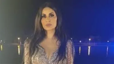 لقطه عفوية تجمع بين ندى الكامل وزوجها