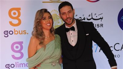 أحمد جمال سعيد وزوجته بتألقان بختام القاهرة السينمائي