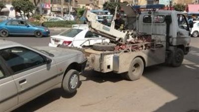 رفع 100 سيارة ودراجة نارية متهالكة فى الشوارع 