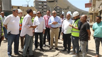 محافظ الجيزة يتابع أعمال طلاء العقارات المطلة علي محور الفريق كمال عامر (صور)
