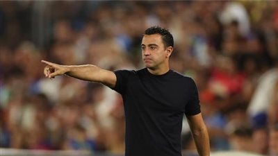 لابورتا يحسم مصير تشافي مع برشلونة 