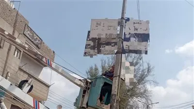إزالة الإعلانات الغير مرخصة بشوارع وميادين الدقهلية
