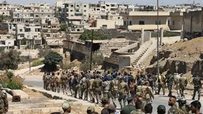 سوريا تعلن الحداد 3 أيام على الضحايا الاعتداء الإرهابي على الكلية الحربية بحمص 