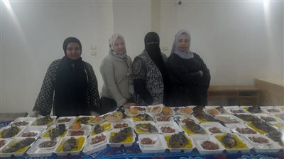 سيدات أسيوط يجهزن 300 وجبة إفطار سمك للصائمين