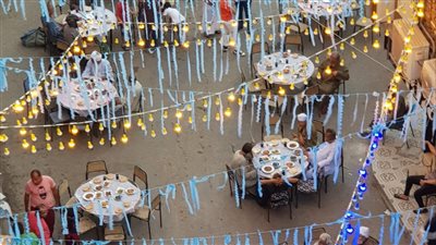 للعام العاشر على التوالى..اهالى المنشية ينظمون اكبر مائدة إفطار جماعى بالأقصر