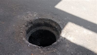 المشدد للمتهمين بسرقة غطاء بلاعة من شوارع الجيزة 