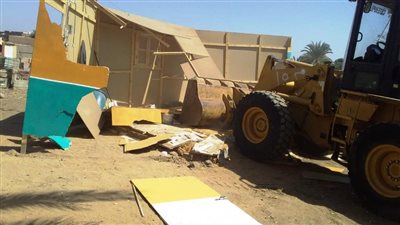  إزالة 19 حالة تعد على الأراضي بأسوان
