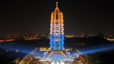 إضاءة برج نانجينغ أحد أبرز رموز العمارة الصينية التقليدية باسم محافظة الجيزة 