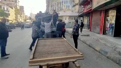 حملة مكبرة بشارع عثمان محرم بالعمرانية والطالبية لرفع التعديات والإشغالات وتسهيل حركة سير المواطنين